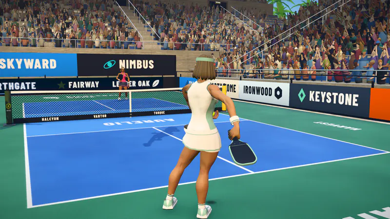 A singles player tossing the ball to serve